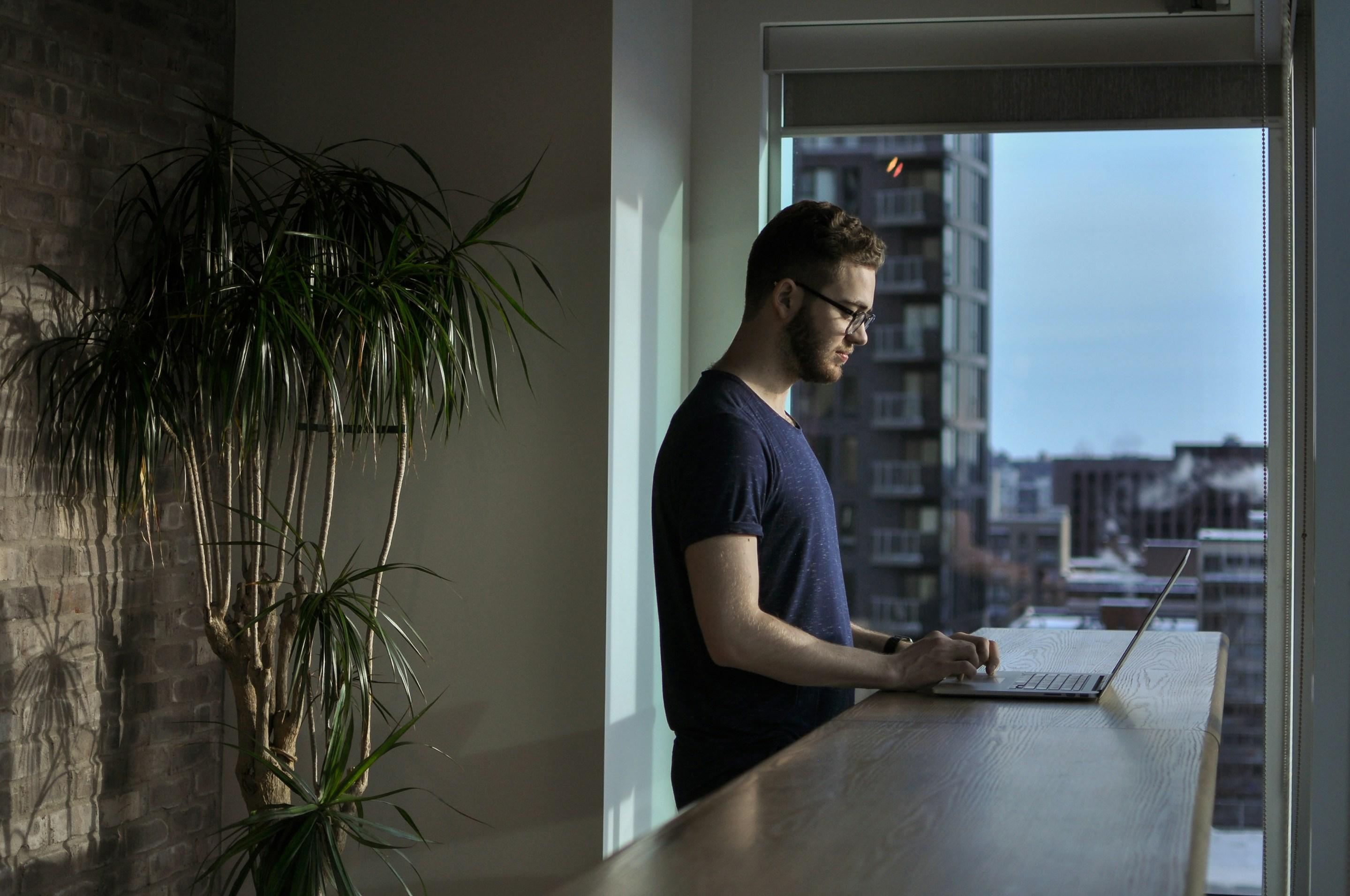 Product specialist working on a laptop